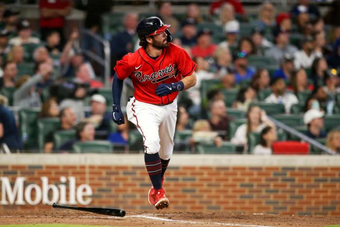 Braves shortstop Dansby Swanson hits a home run against the Mets in the sixth inning at Truist Park.